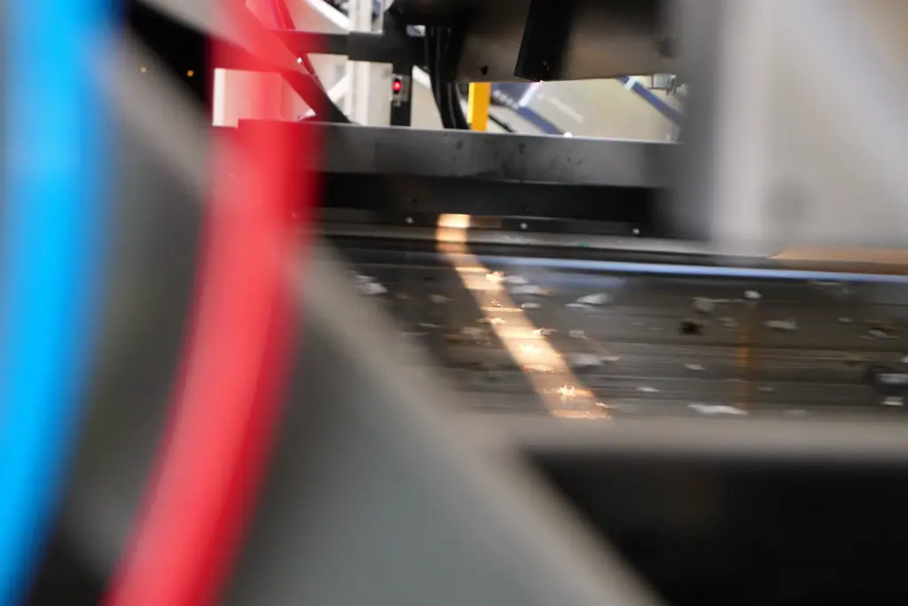 Close-up view of a screening machine in the metal recycling process.