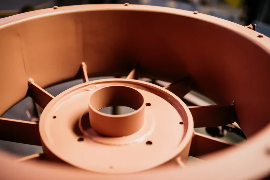 Close-up of a metal component, possibly part of a Welded assembly.