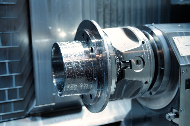 Machining of a turned part at contract manufacturer SPALECK—close-up view of the interior of the CNC machine