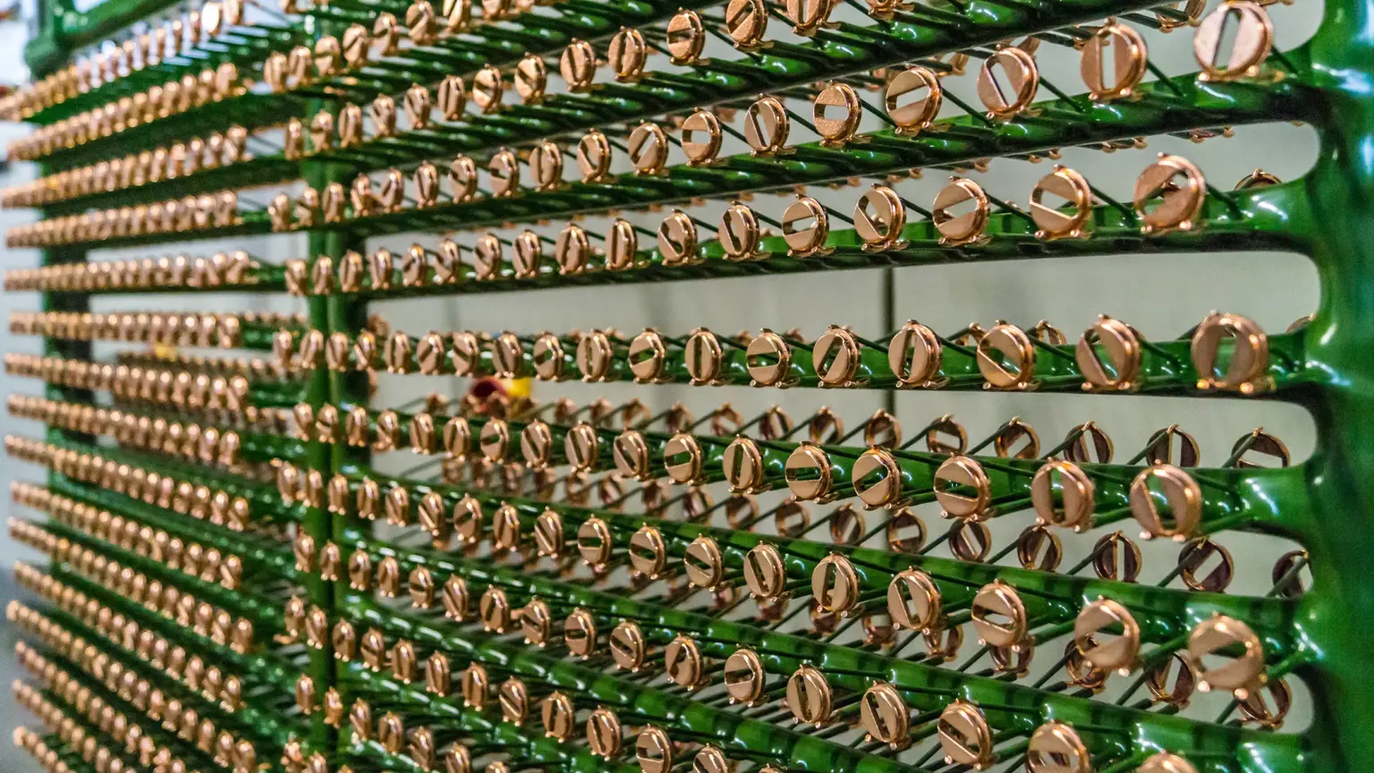 Electroplating of mass-produced parts at SPALECK—here, the parts are being prepared on racks