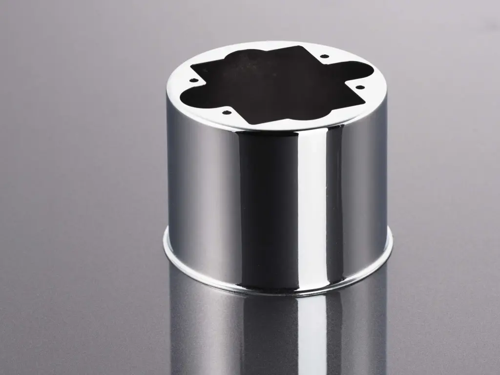 A metal cylinder with a shiny surface as an example of surface finishing.
