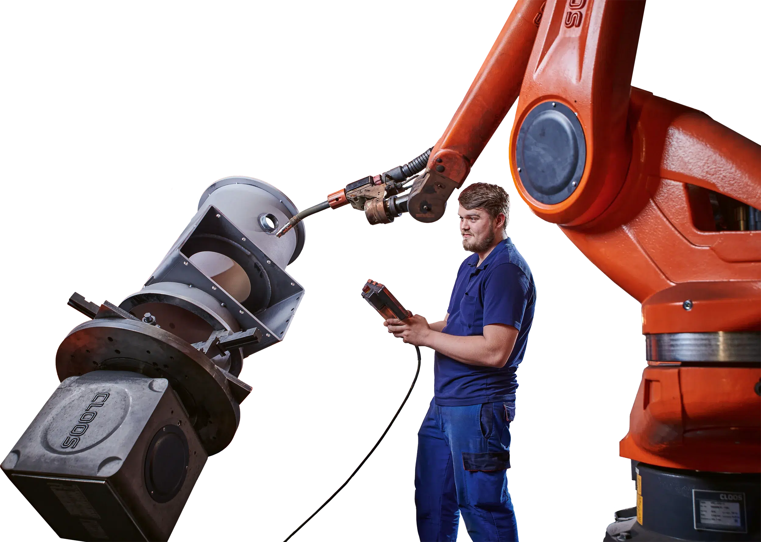 A mechanical fitter operates a welding robot at the contract manufacturer SPALECK