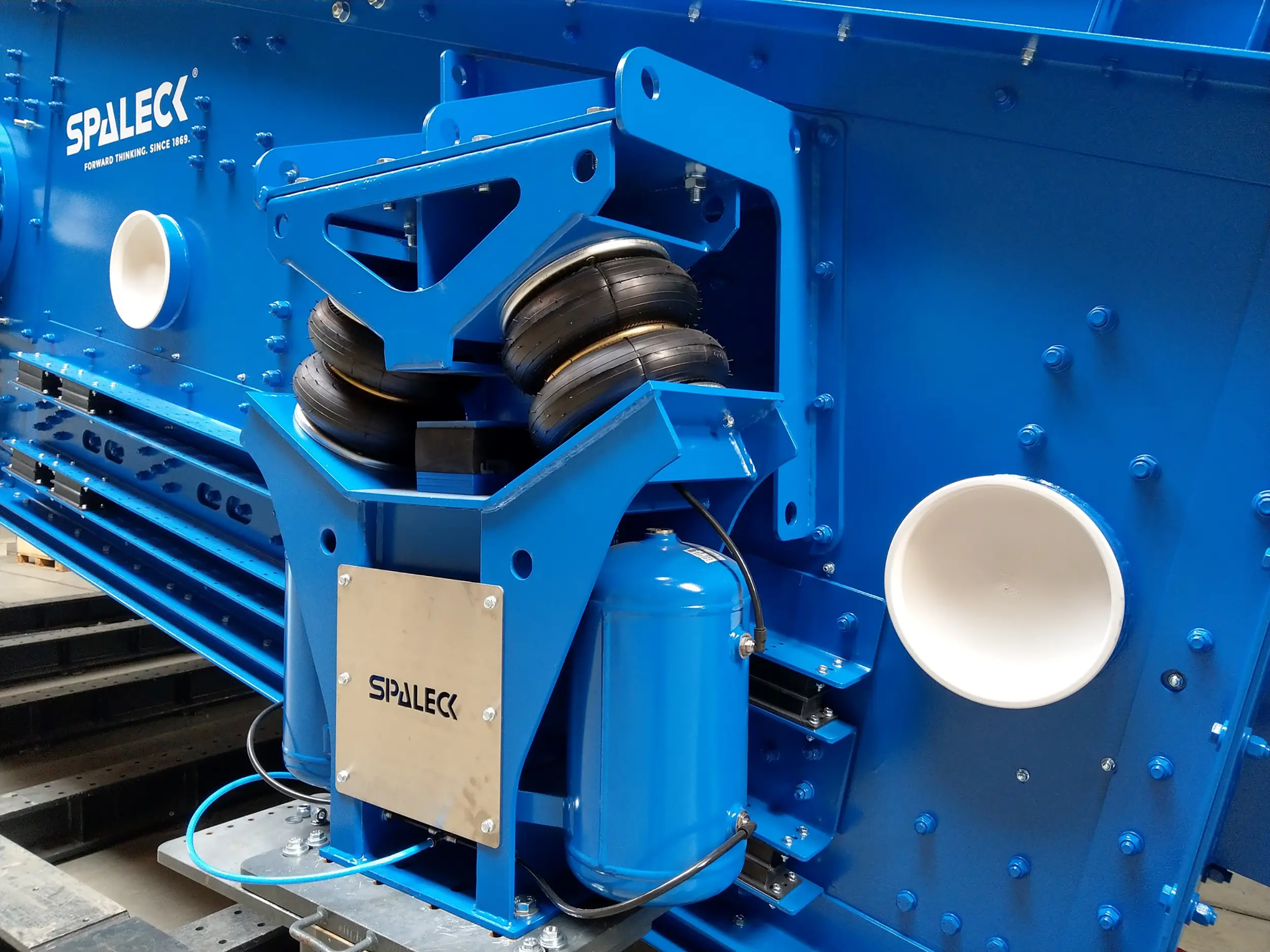 Blue mechanical component from SPALECK with air suspension.