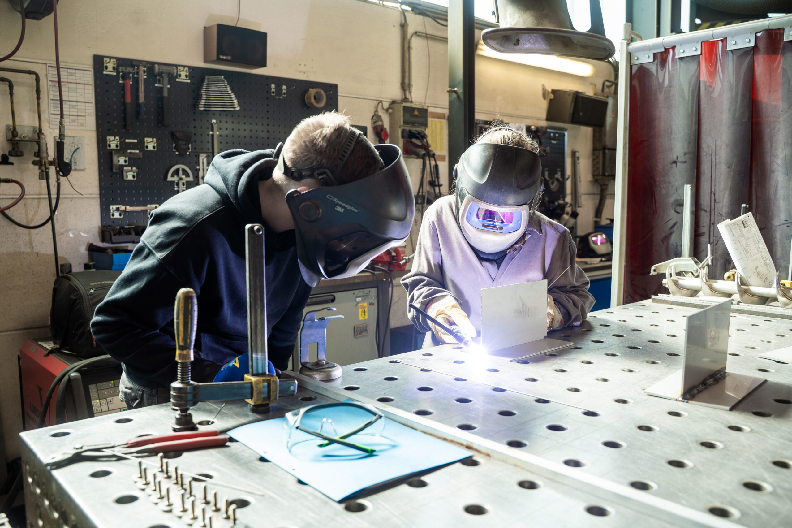 Spaleck Employee Teaches a Student How to Weld
