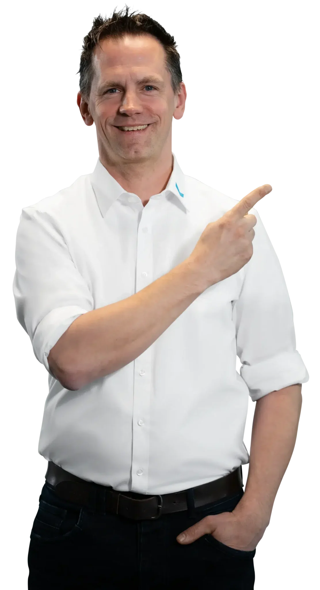 A man in a white shirt is smiling and pointing to the side.
