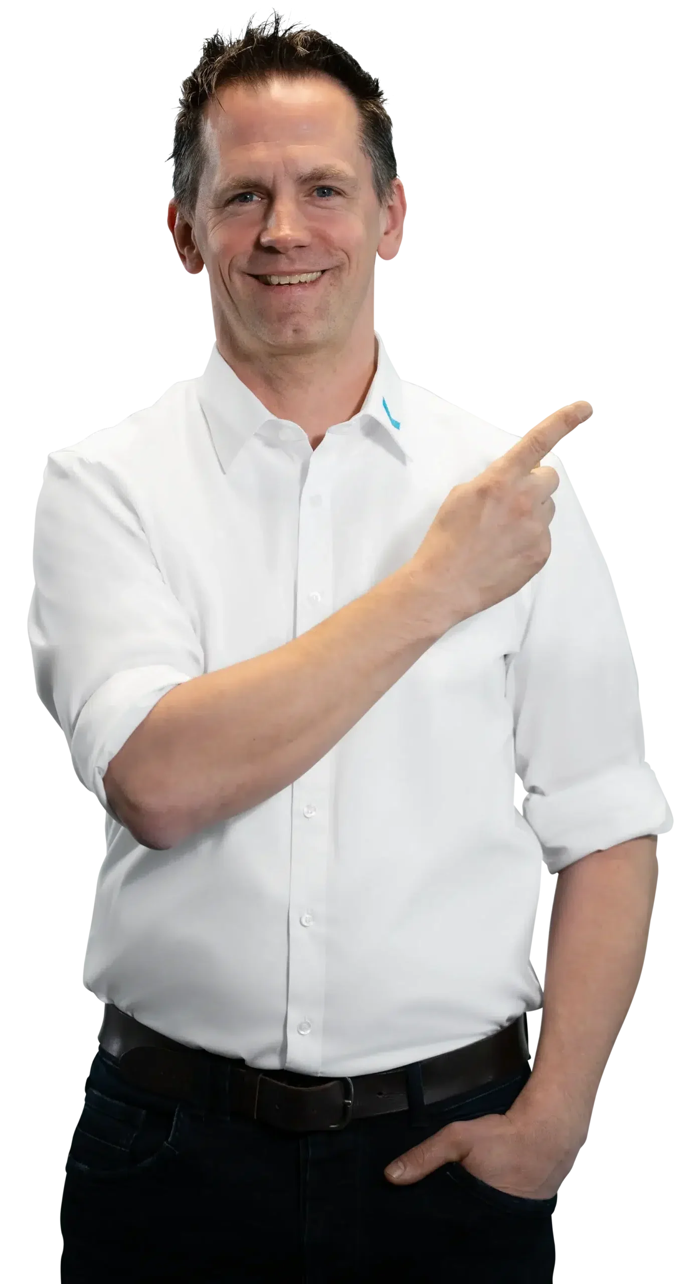 A man in a white shirt is smiling and pointing to the side.