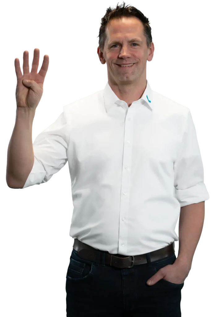 A man in a white shirt holds up four fingers.
