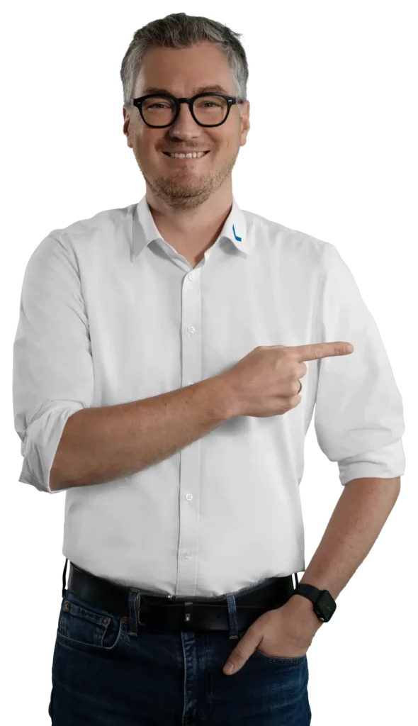 A man in a white shirt is pointing to the side.