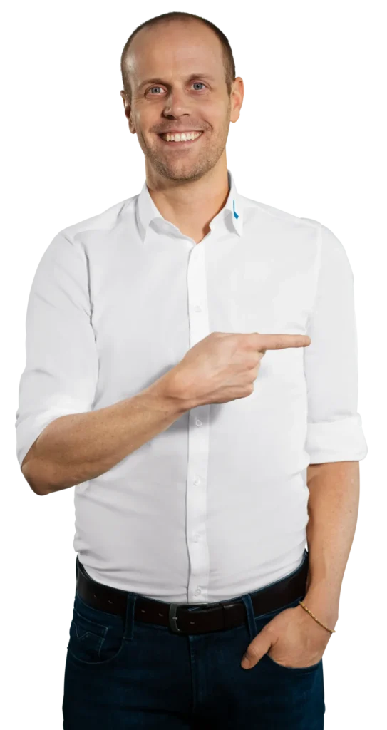 A man in a white shirt is pointing to the right, in the context of -Immark- electronic waste recycling.