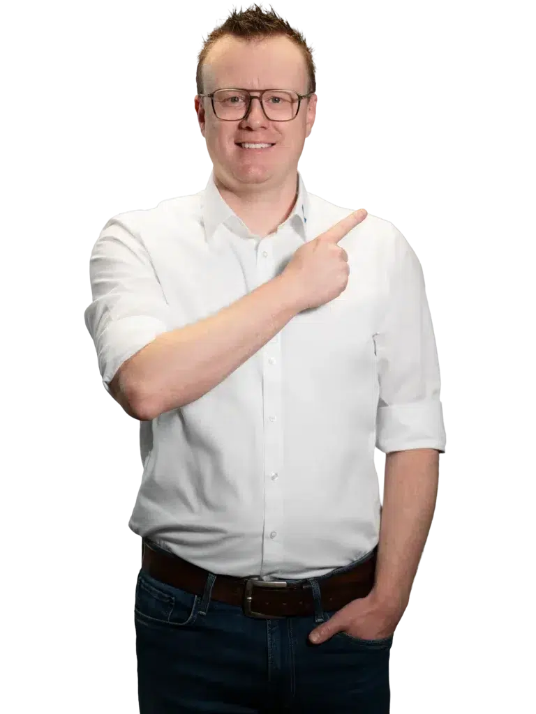 A person in a white shirt is pointing to the right.