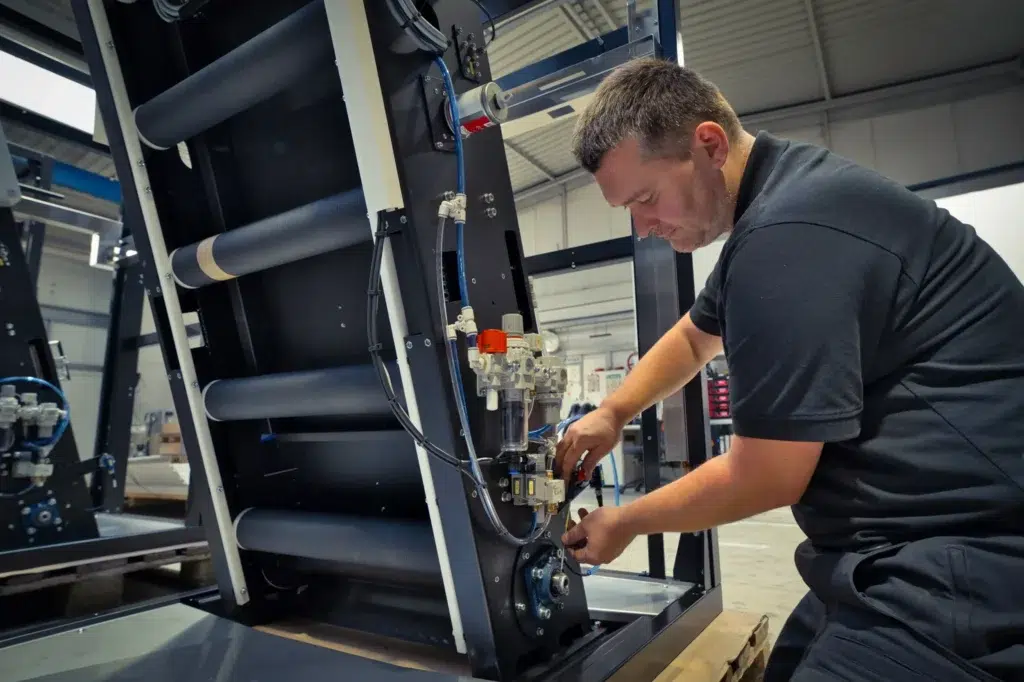 SPALECK mechanics assemble a subassembly, including the electrical installation