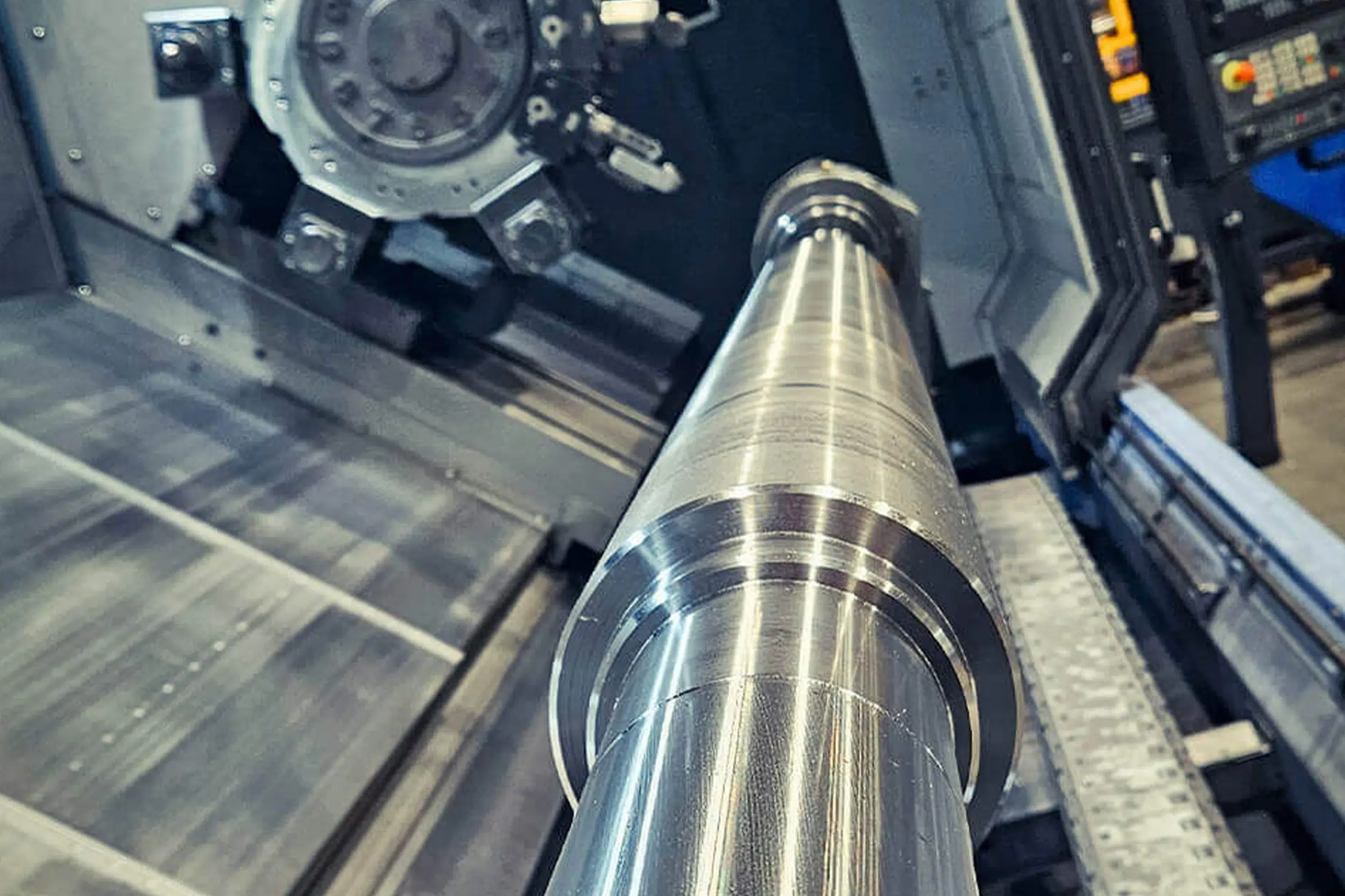 A look inside a CNC machining center used to produce long turned parts at the contract manufacturer SPALECK